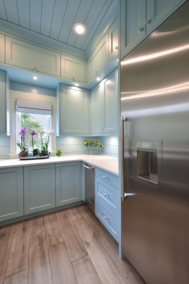 Design ideas for a beach style kitchen pantry in Charleston with stainless steel appliances.