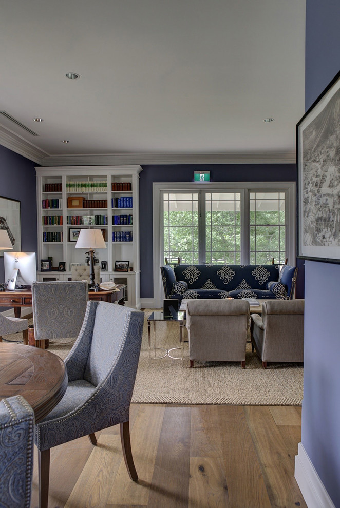 Inspiration for a large contemporary open concept living room in London with blue walls and limestone floors.
