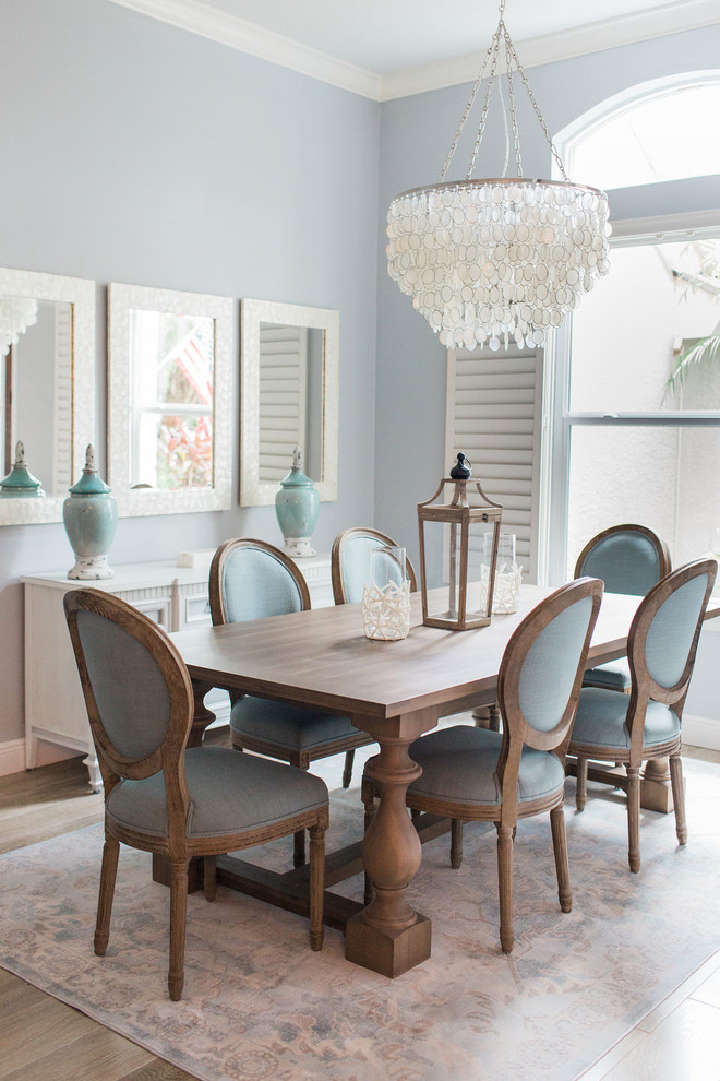 Beach style dining room in Charlotte.