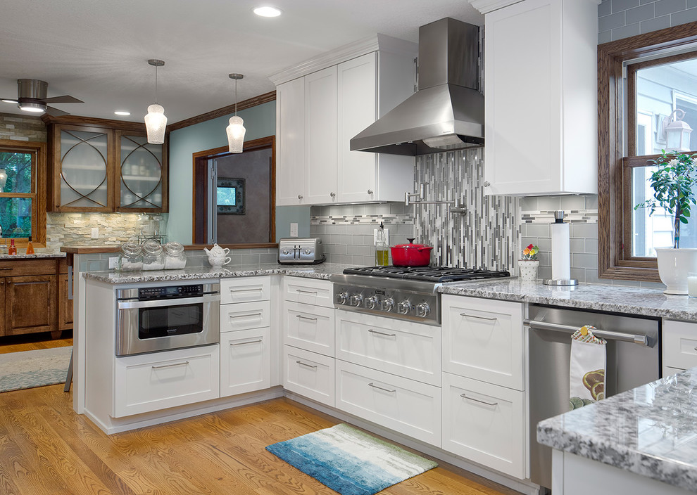 Huge transitional kitchen photo in Minneapolis