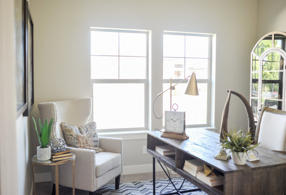Design ideas for a mid-sized transitional home office in Salt Lake City with grey walls, carpet, no fireplace, a freestanding desk and grey floor.