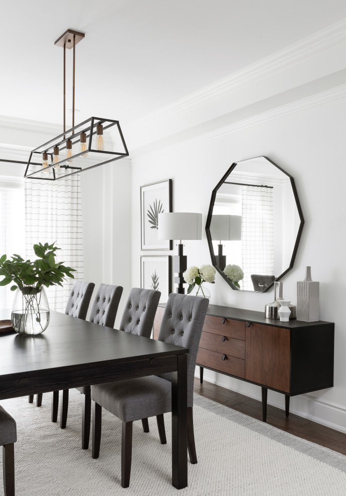 Idée de décoration pour une salle à manger minimaliste de taille moyenne avec un mur blanc, parquet foncé et un plafond à caissons.