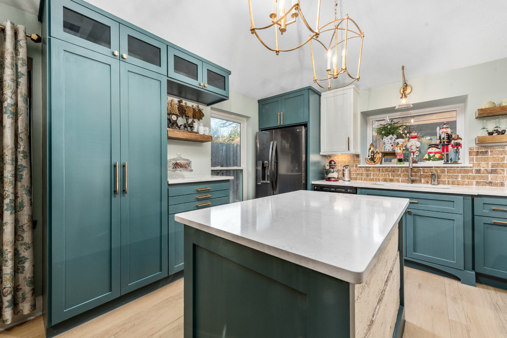 Design ideas for a mid-sized country u-shaped eat-in kitchen in Houston with an undermount sink, shaker cabinets, turquoise cabinets, quartz benchtops, brown splashback, brick splashback, stainless steel appliances, light hardwood floors, with island, beige floor and white benchtop.