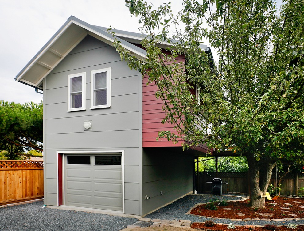 Design ideas for a small contemporary two-storey exterior in Seattle with concrete fiberboard siding.