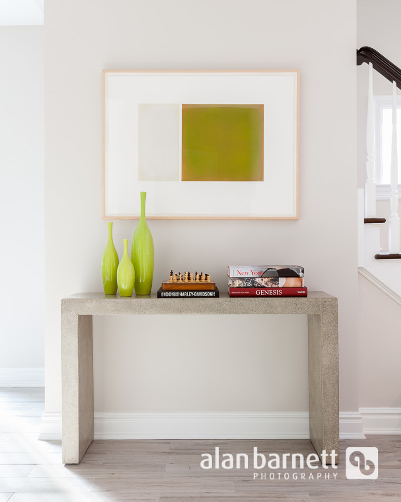 Example of a transitional foyer design in New York