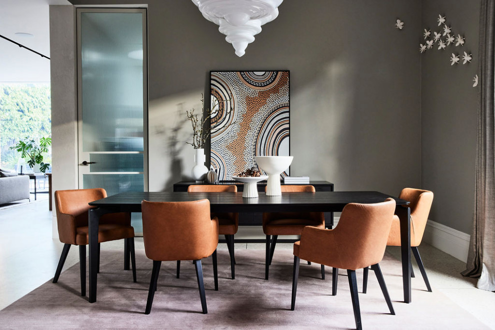 Example of a trendy dining room design in Melbourne