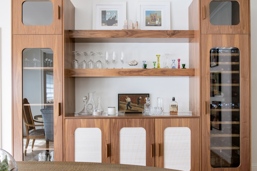 This is an example of a transitional home bar in Dallas.