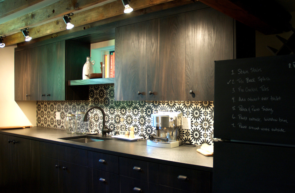 Mid-sized transitional walk-out concrete floor basement photo in Seattle with white walls