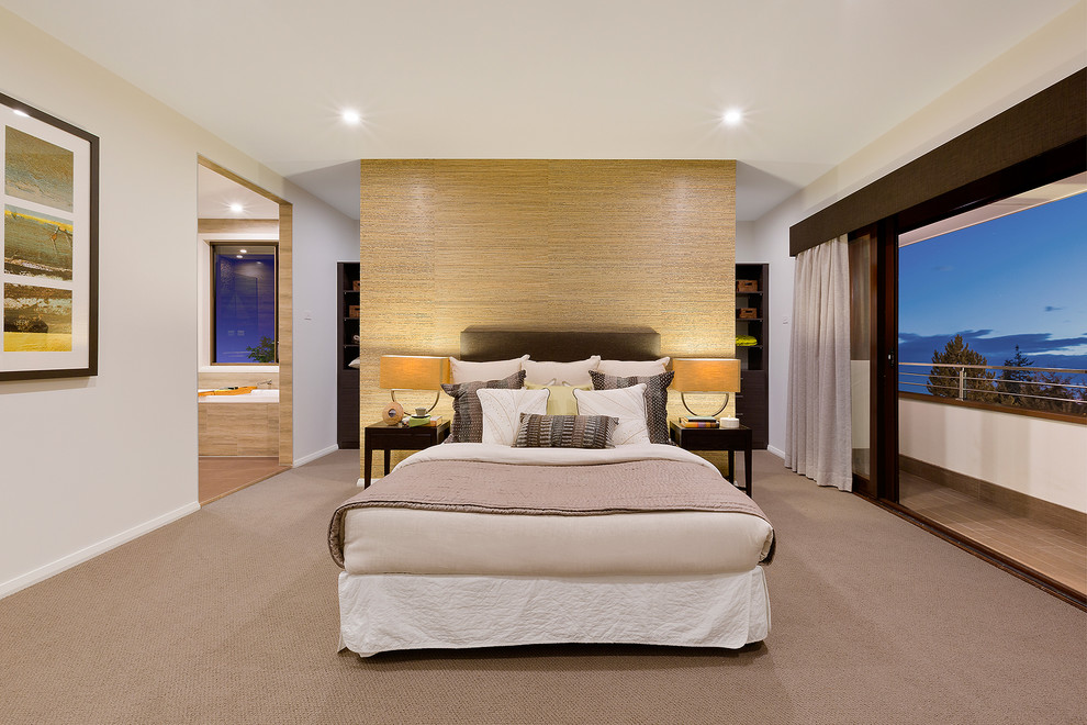 This is an example of a mid-sized contemporary master bedroom in Sydney with white walls and carpet.