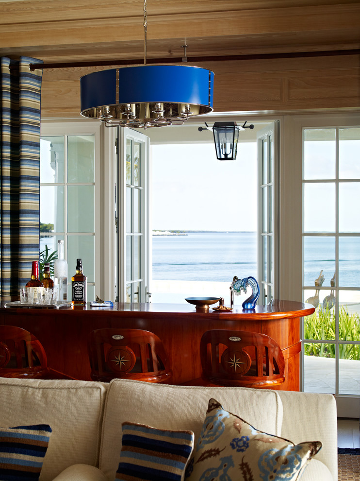 Inspiration for a beach style home bar in Miami.
