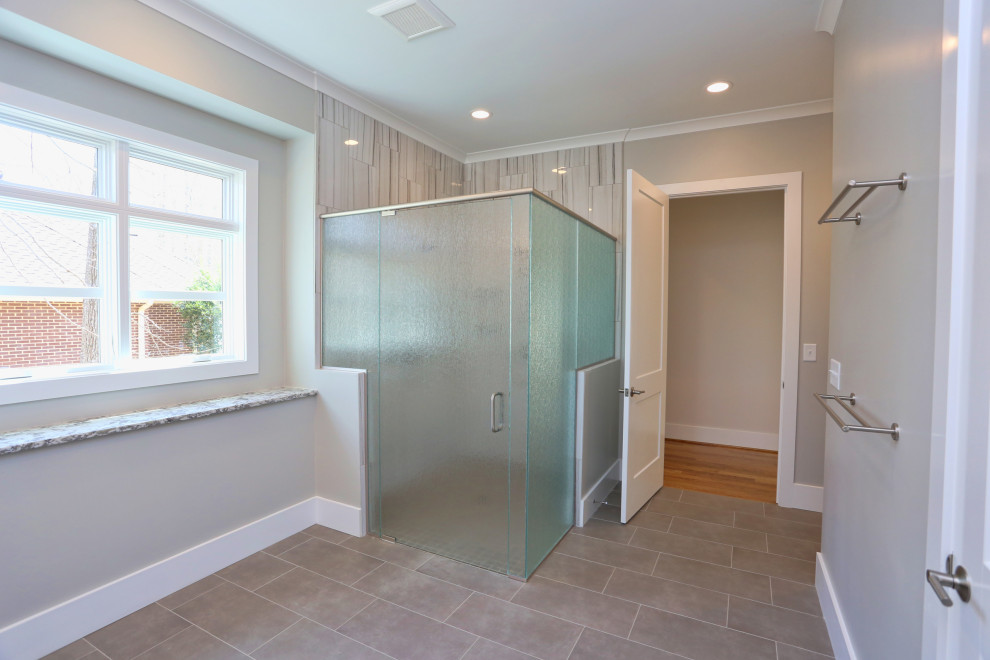 Example of a transitional home design design in Raleigh