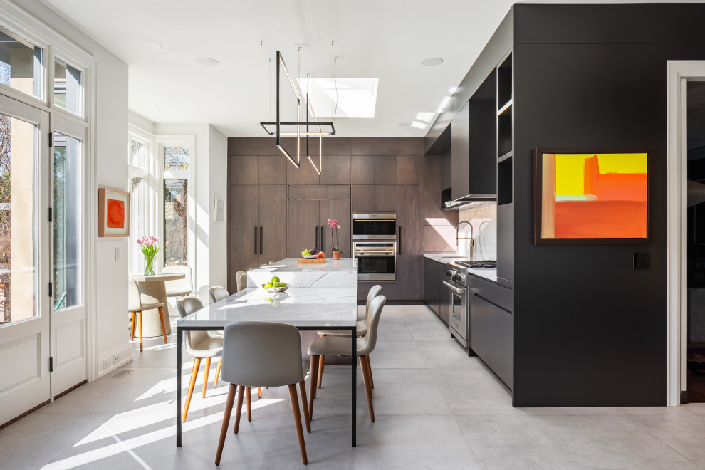 Photo of a large contemporary l-shaped eat-in kitchen in Toronto with a double-bowl sink, flat-panel cabinets, dark wood cabinets, marble benchtops, white splashback, marble splashback, stainless steel appliances, porcelain floors, with island, grey floor and white benchtop.