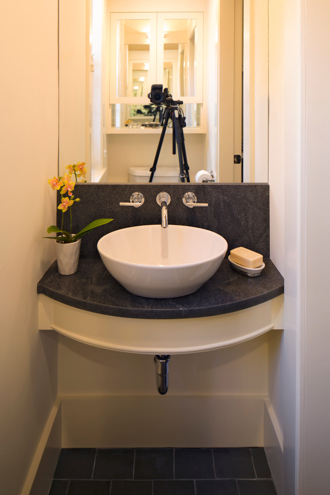 Small transitional ceramic tile home design photo in Boston with white cabinets, white walls, a vessel sink and granite countertops