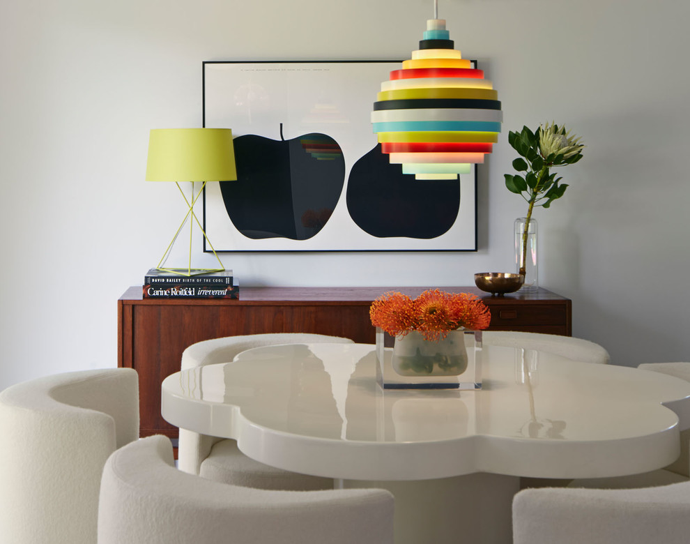 Inspiration for a midcentury dining room in San Francisco with white walls.