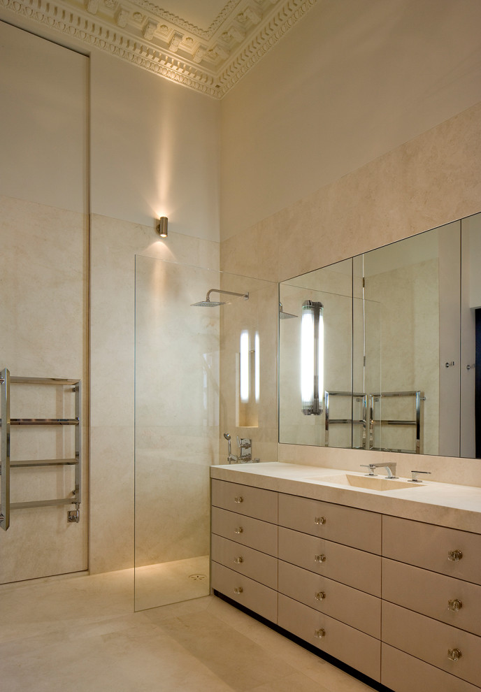 Large eclectic master bathroom in London with flat-panel cabinets, beige cabinets, an open shower, beige tile, marble, beige walls, marble floors, a drop-in sink, marble benchtops, beige floor, an open shower, beige benchtops, a single vanity, a built-in vanity and coffered.