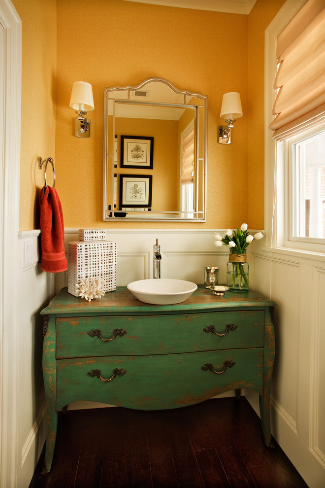 Small elegant dark wood floor powder room photo in Portland with a vessel sink, furniture-like cabinets and green cabinets