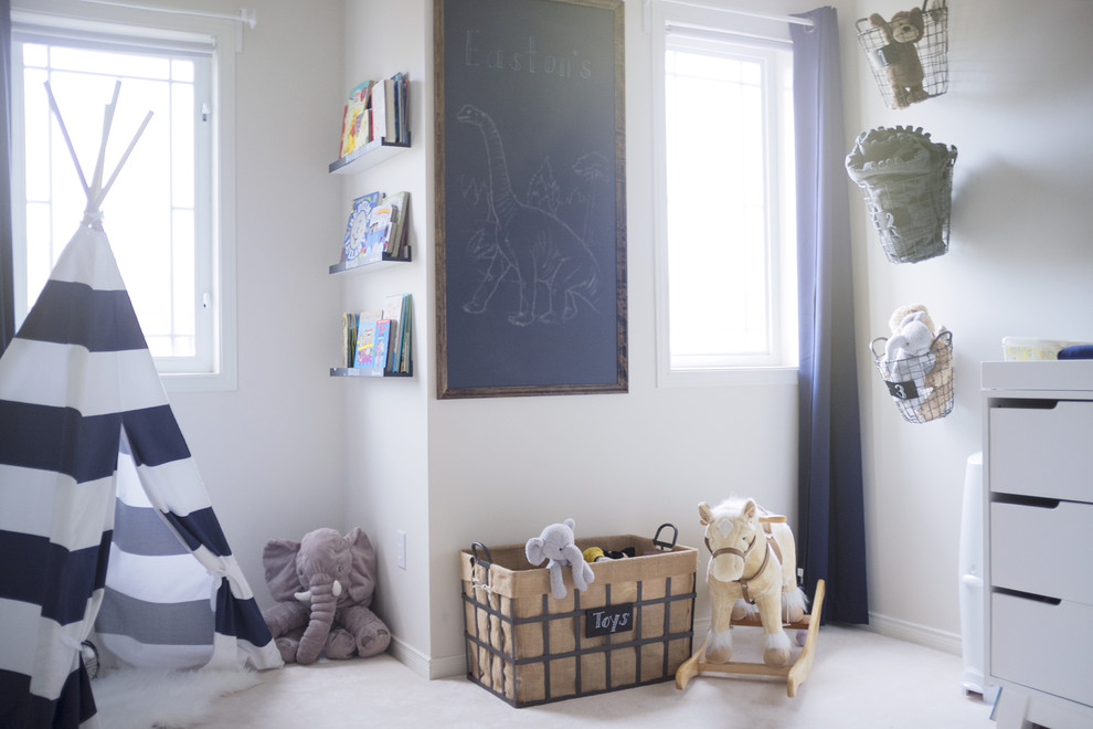Photo of a mid-sized country gender-neutral kids' room in Ottawa with white walls, carpet and white floor.