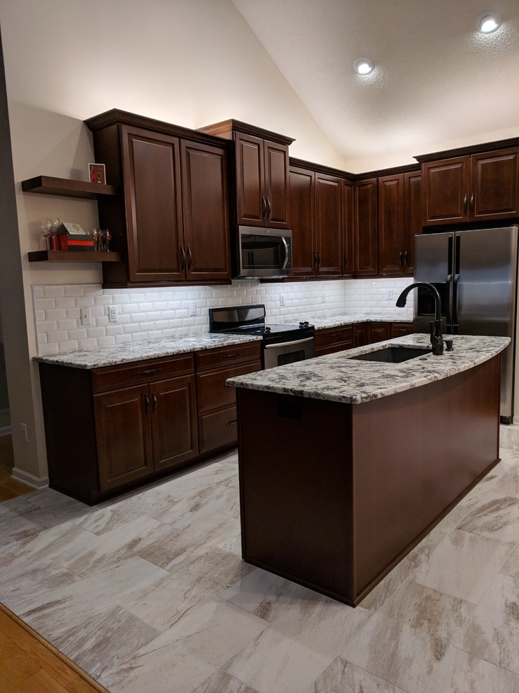 Example of a transitional home design design in Charlotte