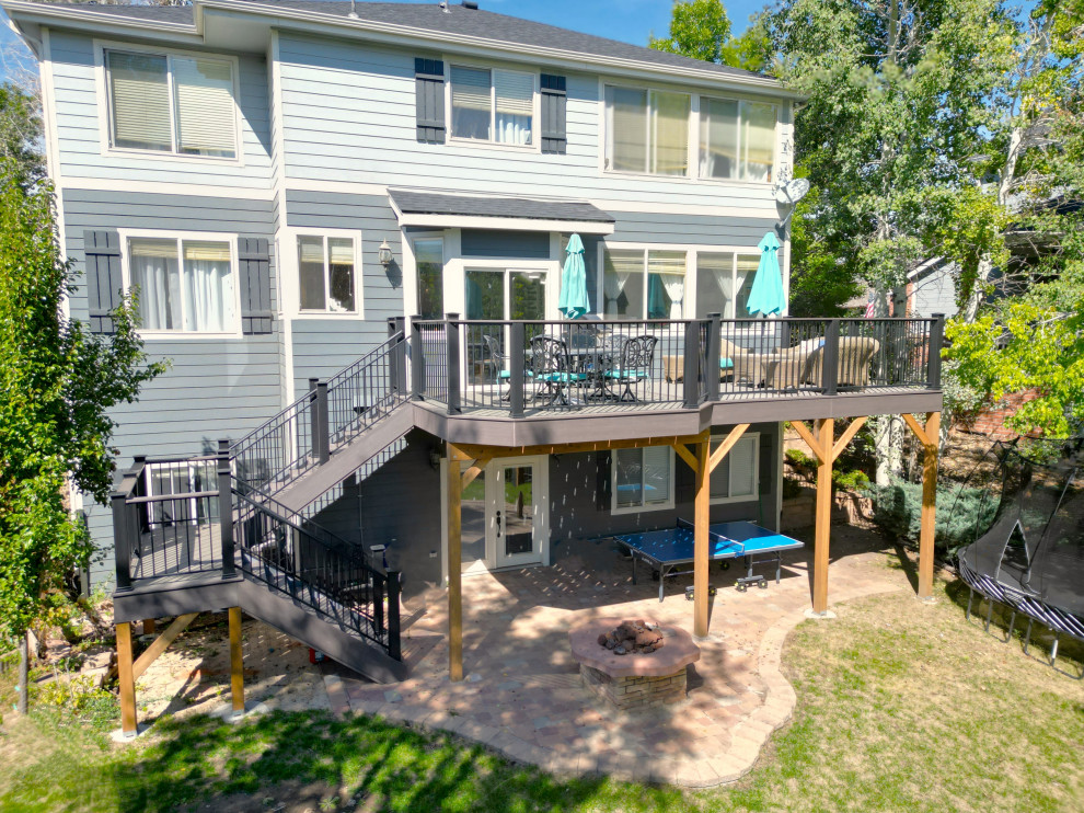 Medium sized contemporary back first floor metal railing terrace in Denver with skirting.