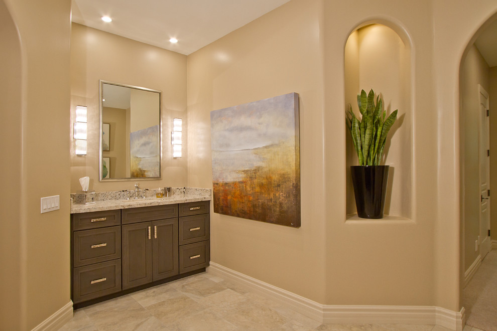 Design ideas for a large transitional master bathroom in Phoenix with shaker cabinets, grey cabinets, an open shower, a two-piece toilet, beige tile, stone tile, black walls, travertine floors, an undermount sink and engineered quartz benchtops.