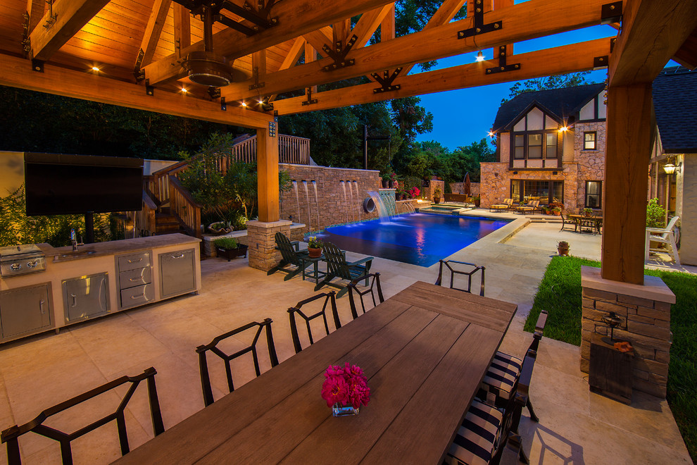 Design ideas for a large country side yard patio in Austin with natural stone pavers.