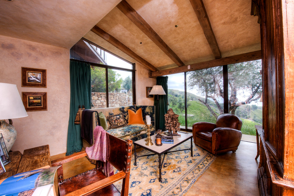 Big Sur Coast Ridge Estate - Breathtaking views of the incomparable Big Sur Coast, this classic Tuscan design of an Italian farmhouse, combined with a modern approach creates an ambiance of relaxed sophistication for this magnificent 95.73-acre, private coastal estate on California’s Coastal Ridge. Five-bedroom, 5.5-bath, 7,030 sq. ft. main house, and 864 sq. ft. caretaker house over 864 sq. ft. of garage and laundry facility. Commanding a ridge above the Pacific Ocean and Post Ranch Inn, this spectacular property has sweeping views of the California coastline and surrounding hills. “It’s as if a contemporary house were overlaid on a Tuscan farm-house ruin,” says decorator Craig Wright who created the interiors. The main residence was designed by renowned architect Mickey Muenning—the architect of Big Sur’s Post Ranch Inn, —who artfully combined the contemporary sensibility and the Tuscan vernacular, featuring vaulted ceilings, stained concrete floors, reclaimed Tuscan wood beams, antique Italian roof tiles and a stone tower. Beautifully designed for indoor/outdoor living; the grounds offer a plethora of comfortable and inviting places to lounge and enjoy the stunning views. No expense was spared in the construction of this exquisite estate.