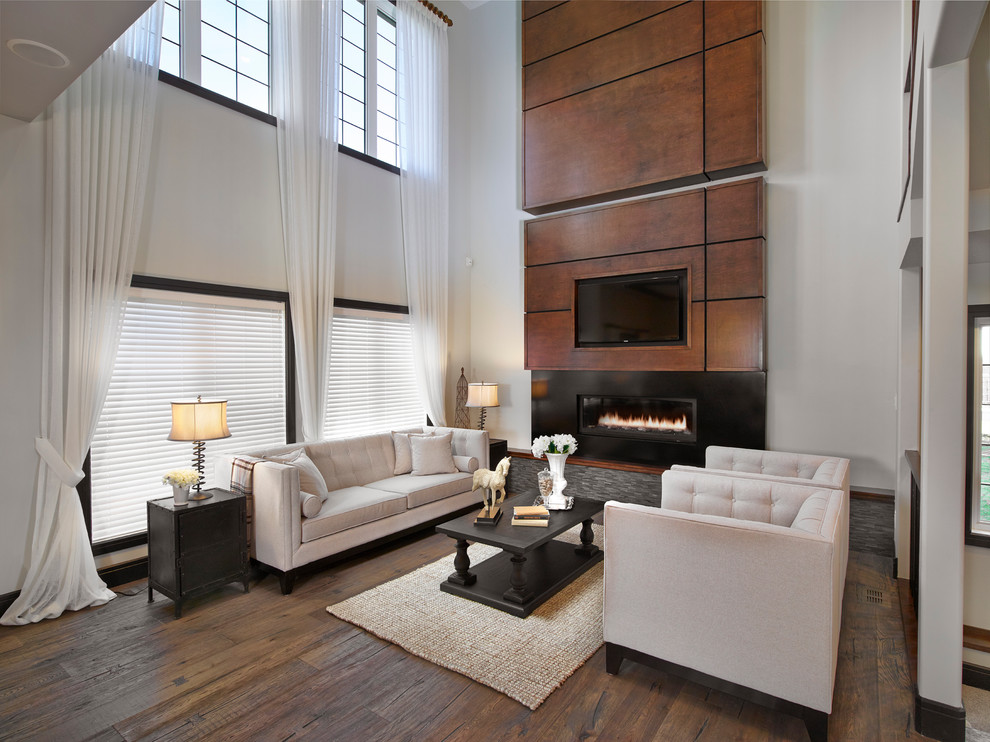 Design ideas for a transitional living room in Edmonton with a ribbon fireplace and a wall-mounted tv.