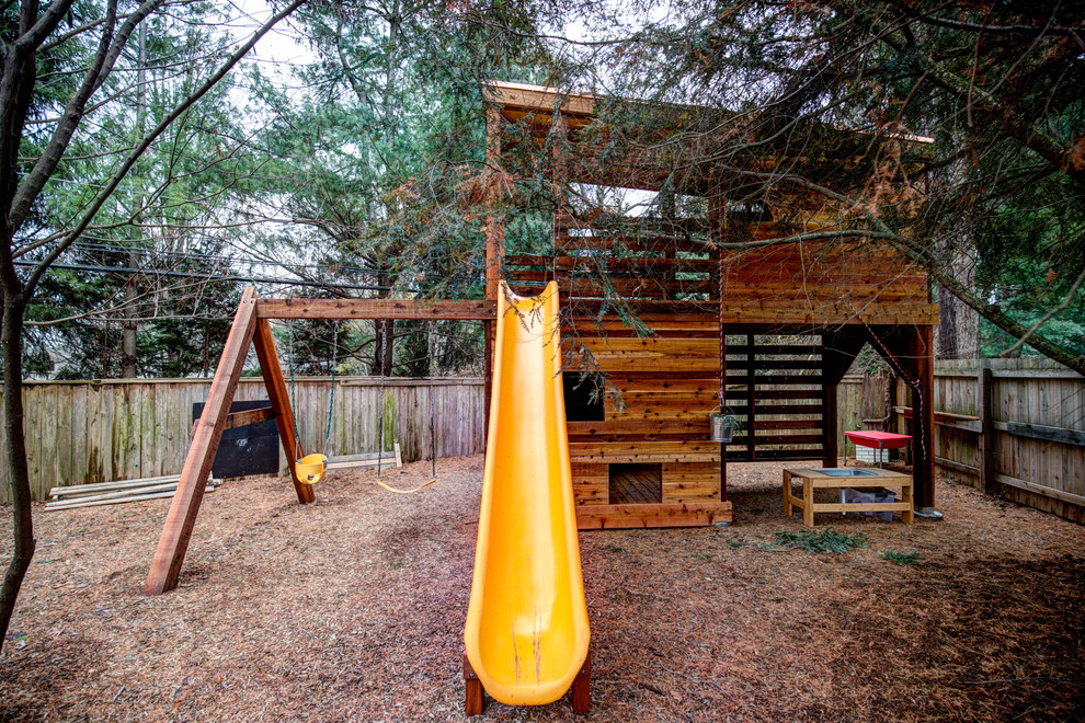 Inspiration for an expansive country backyard outdoor sport court in Other with with outdoor playset and mulch.