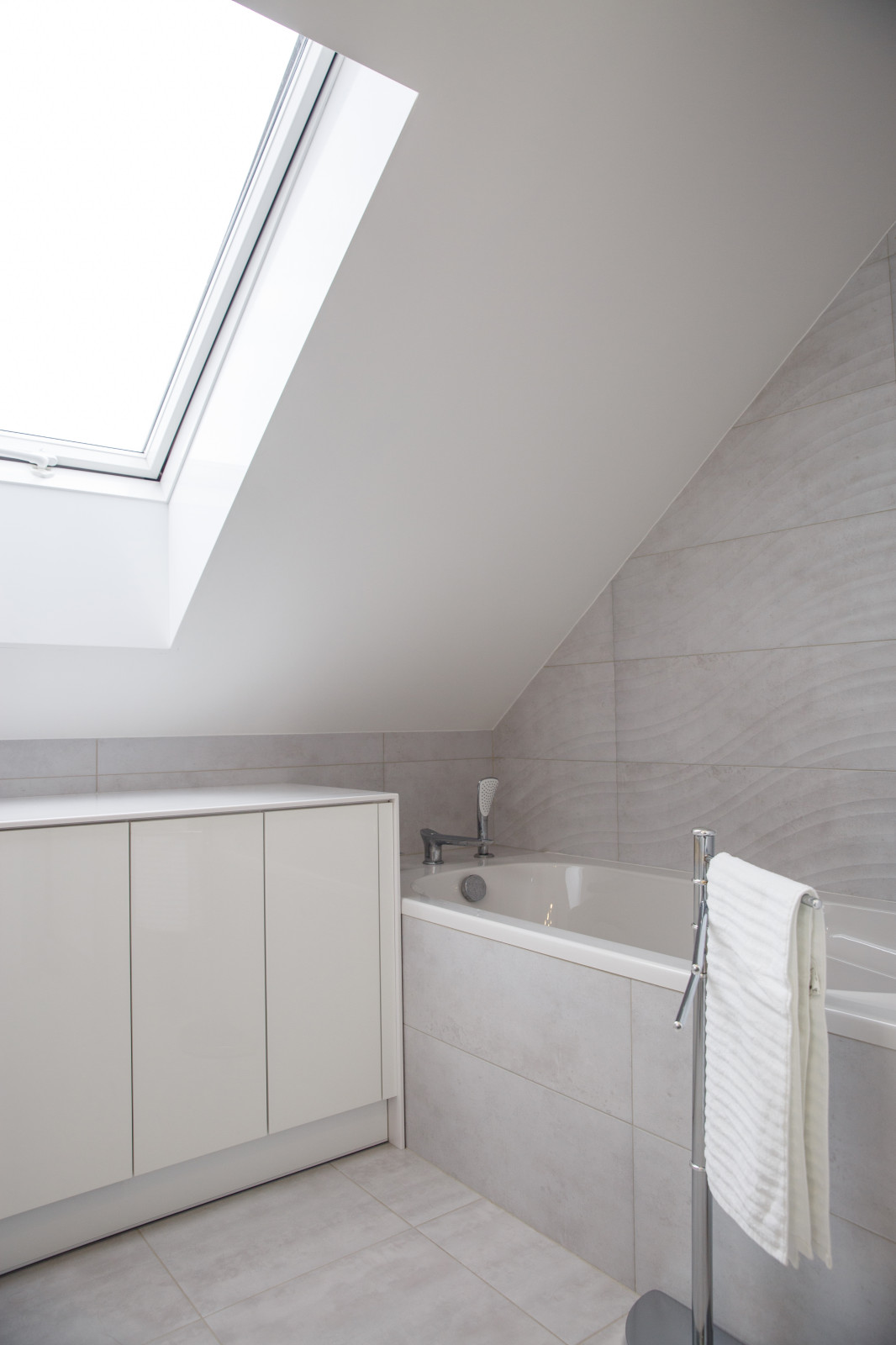 Двухэтажная квартира с мансардным потолком