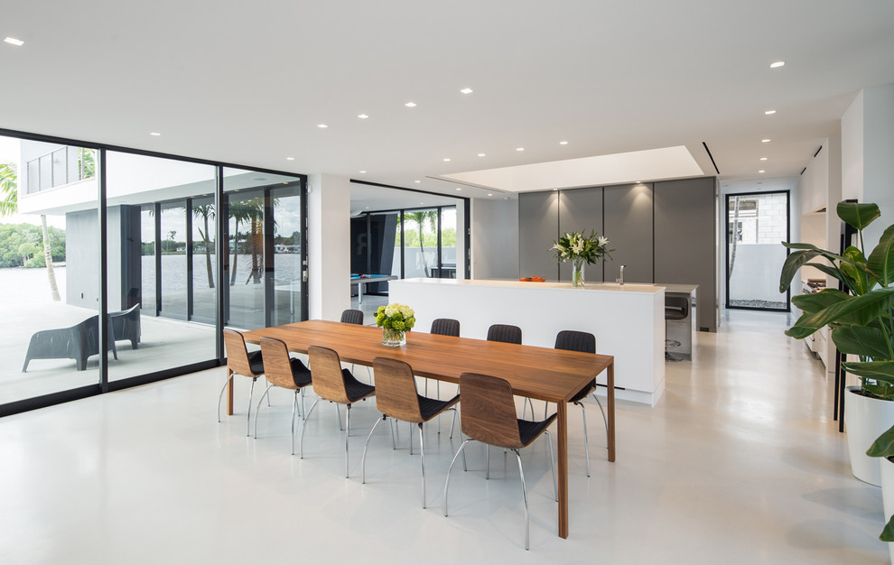 Photo of a contemporary kitchen/dining combo in Los Angeles with white walls.