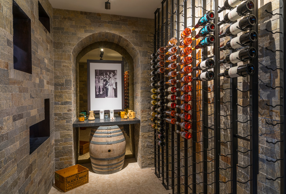 Contemporary wine cellar in New York with storage racks and beige floor.