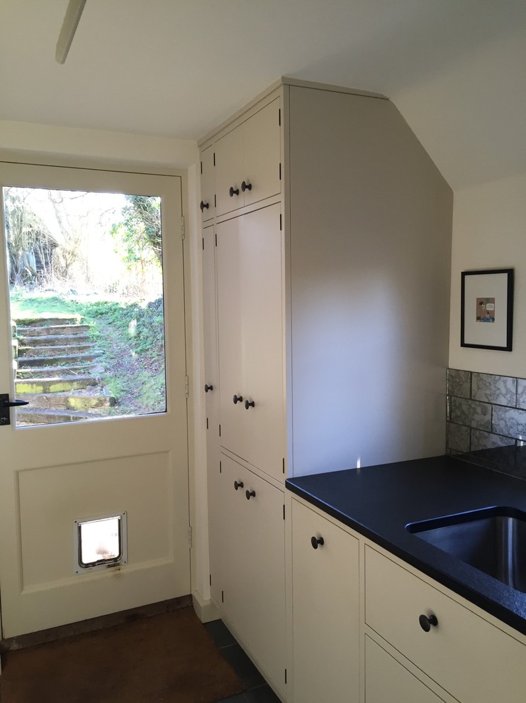 Utility Room boiler housing, airing cupboard, ironing board cupboard