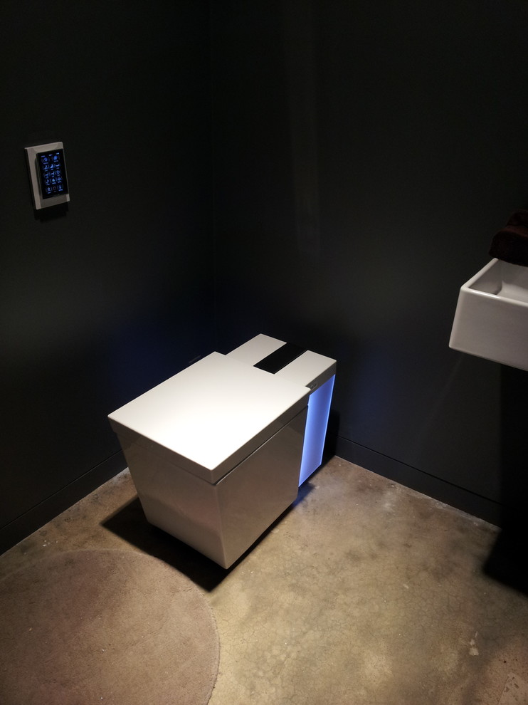 Trendy master white tile and porcelain tile concrete floor walk-in shower photo with a one-piece toilet, gray walls, furniture-like cabinets, a hot tub and a vessel sink