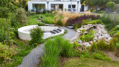 Sloping Backyard Gains Lush Garden Rooms for Outdoor Living