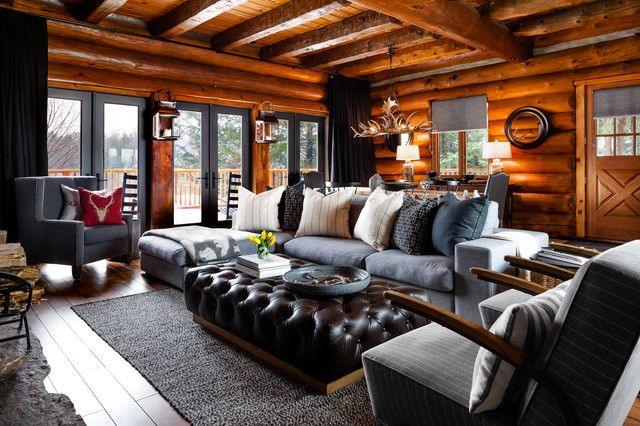 Rosseau log cabin living room in montagna soggiorno for Soggiorno montagna