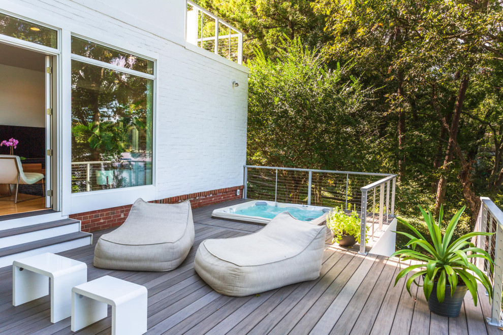 Large contemporary backyard deck in DC Metro.