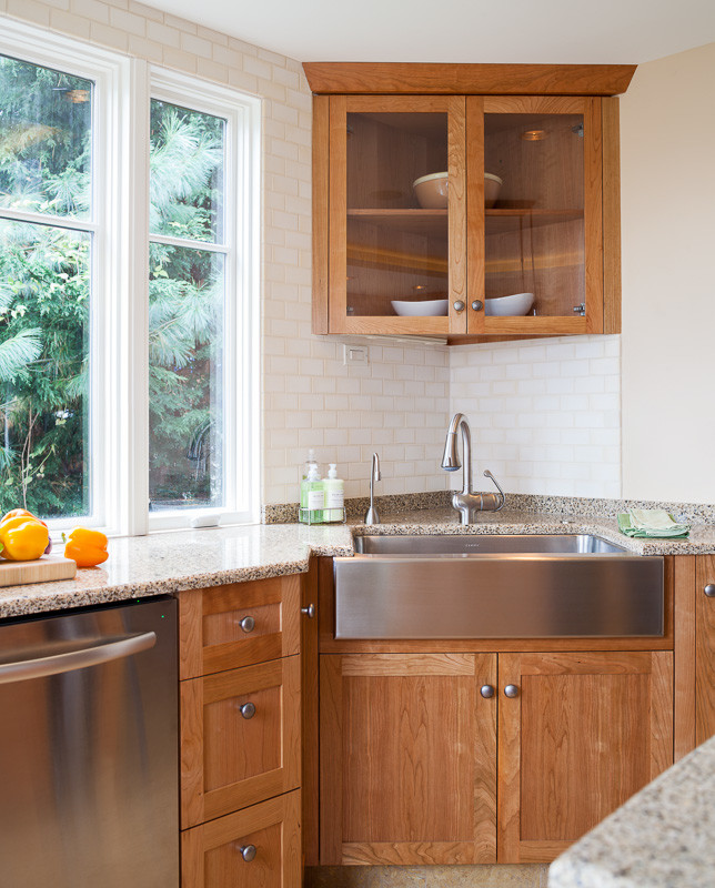 Photo of a contemporary u-shaped eat-in kitchen in Seattle.