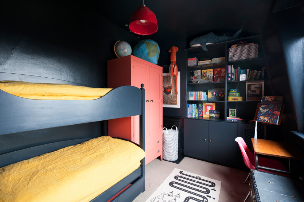 This is an example of a traditional kids' room in Los Angeles with black walls, carpet and black floor.
