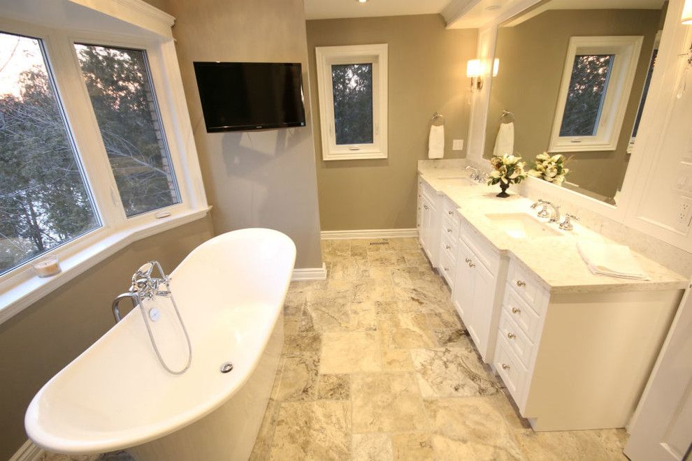 Inspiration for a traditional bathroom in Toronto with a freestanding tub.