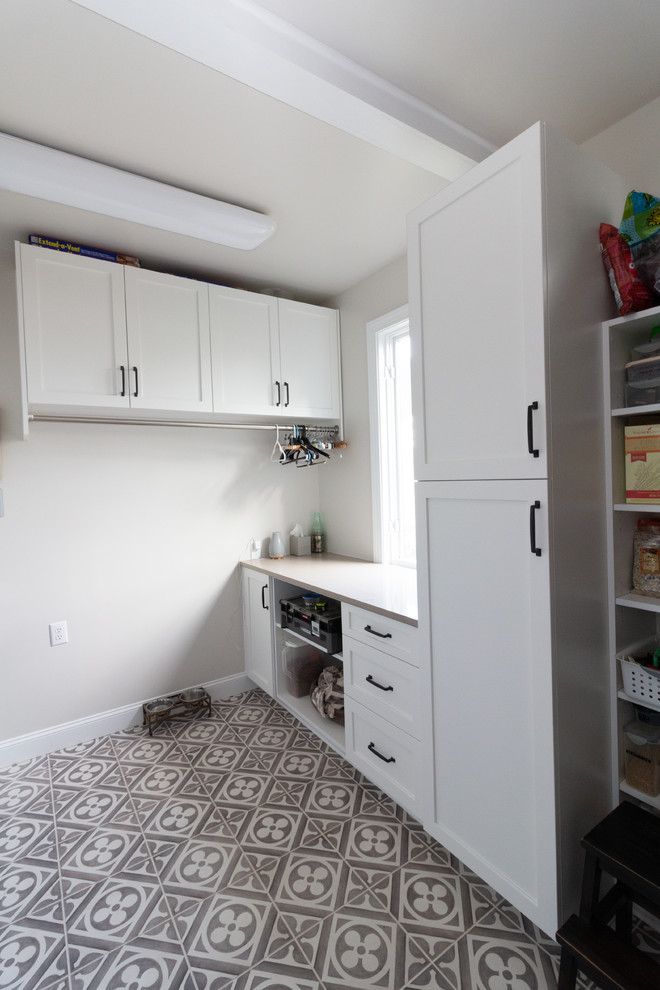 Inspiration for a large l-shaped eat-in kitchen remodel with shaker cabinets, white cabinets, granite countertops, an island and white countertops