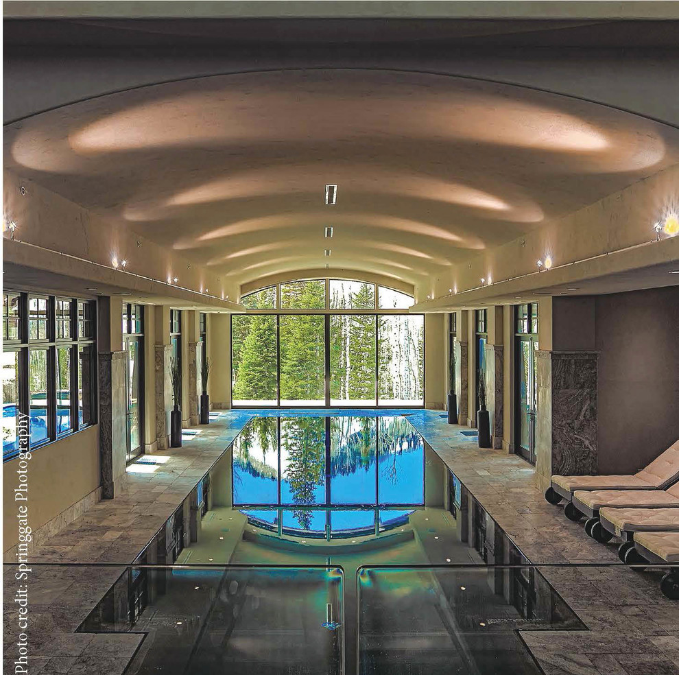 Pool house - huge transitional indoor stone and rectangular pool house idea in Salt Lake City