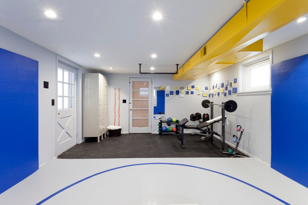 Inspiration for a contemporary multipurpose gym in New York with grey walls.