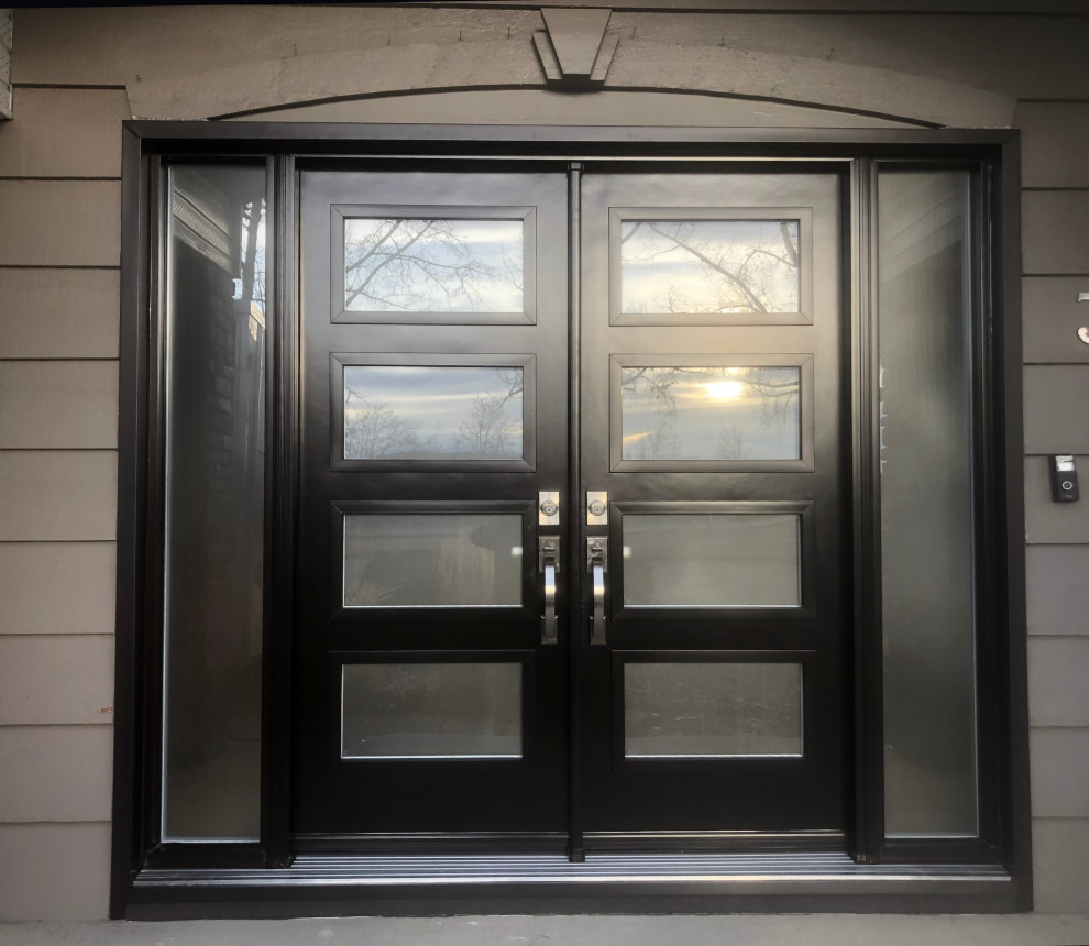 Photo of a contemporary front door in Calgary with grey walls, a double front door and a brown front door.