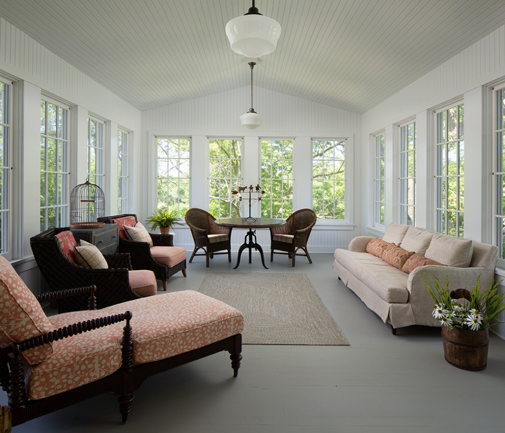 This is an example of a country sunroom in Milwaukee.