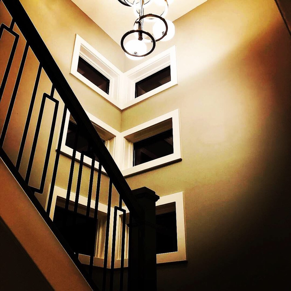 Stairway windows and chandelier