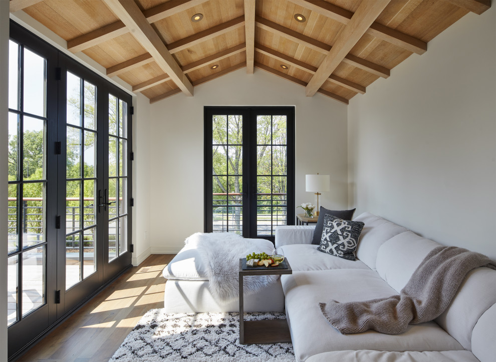 Example of a tuscan family room design in Minneapolis