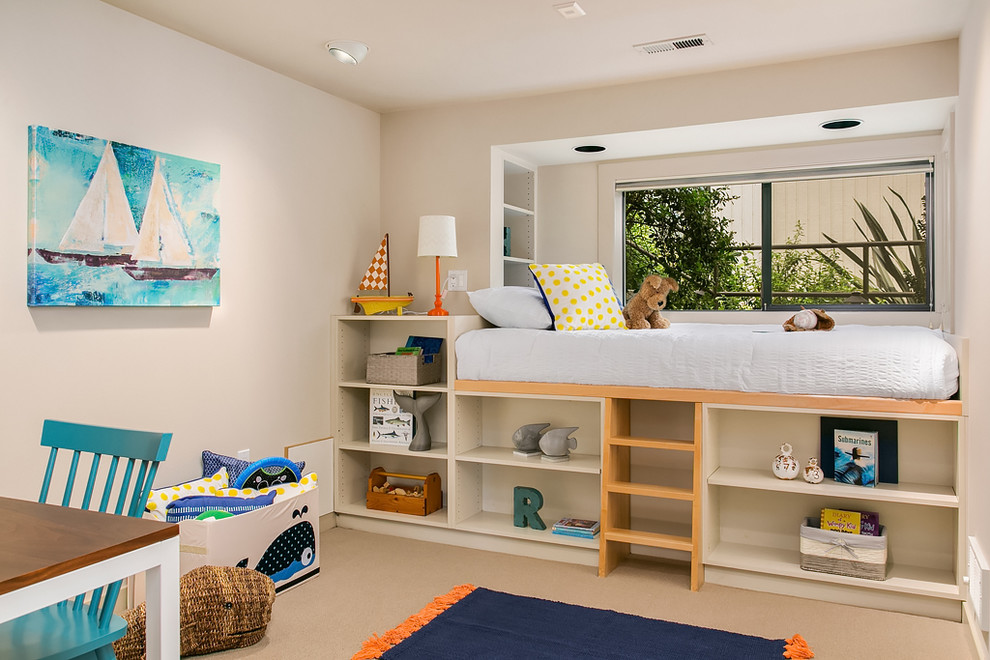 Inspiration for a mid-sized transitional kids' bedroom for kids 4-10 years old and boys in Seattle with beige walls and carpet.