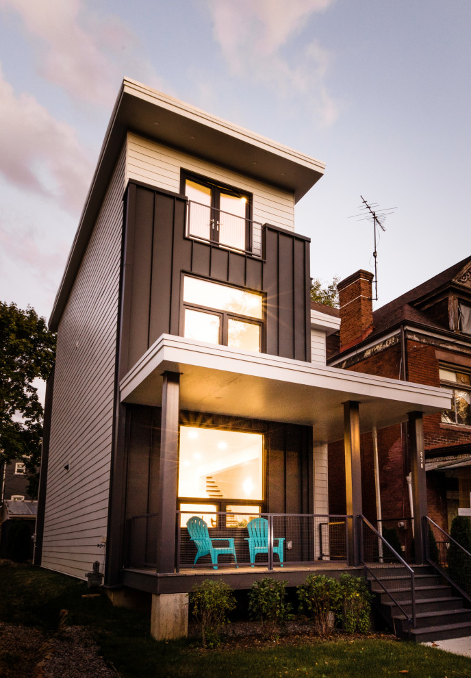 Example of a large transitional home design design