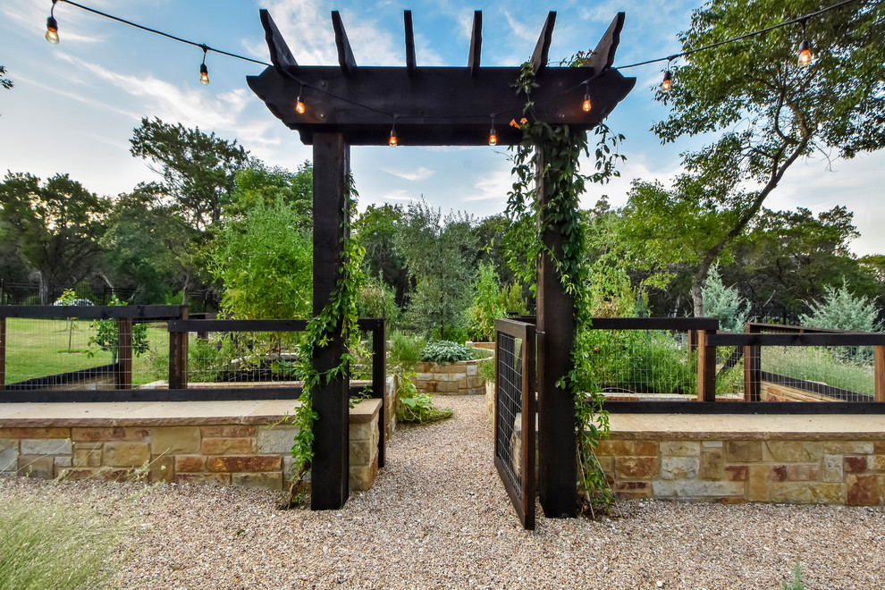 This is an example of a mid-sized garden in Austin.