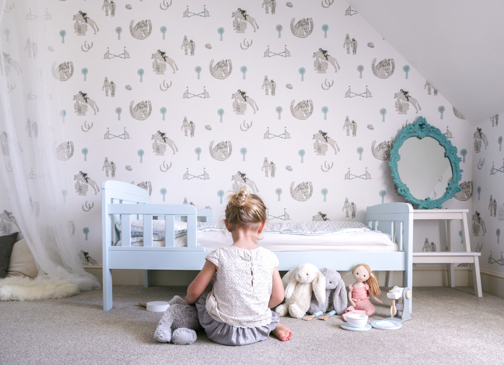 Design ideas for a country gender-neutral kids' room for kids 4-10 years old in Hertfordshire with white walls.